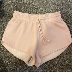 Aritzia TNA cozy fleece pink boyfriend shorts